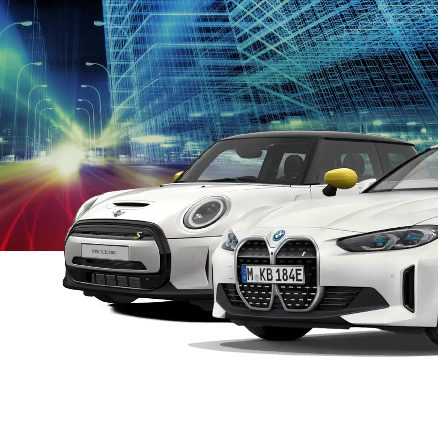 Hero-Image-Kopie-1-1 BMW Charging Solution Navigator – Key Visual mit Mini Electric und BMW i4 vor stilisierter digitaler Stadtsilhouette